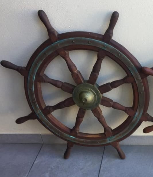 Antique fishing trawler wheel — before restoration